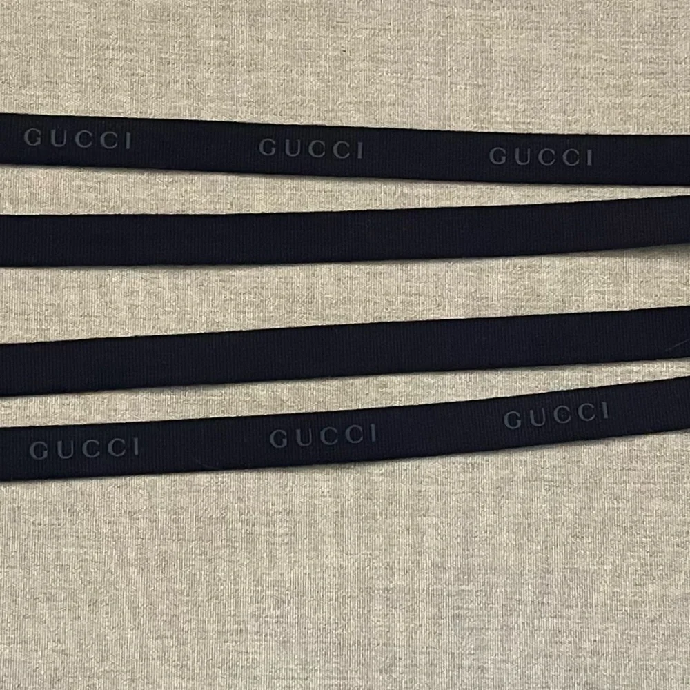 Authentic Gucci Black Embossed Logo Ribbon